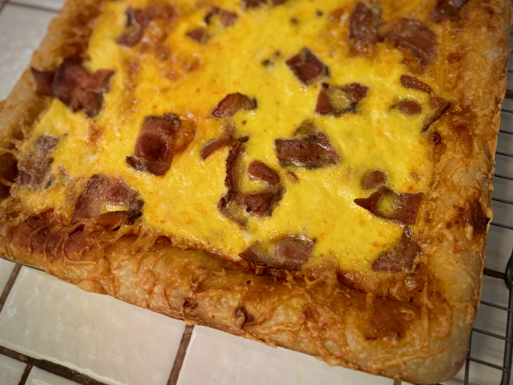 Bacon, egg, and cheese sourdough pizza